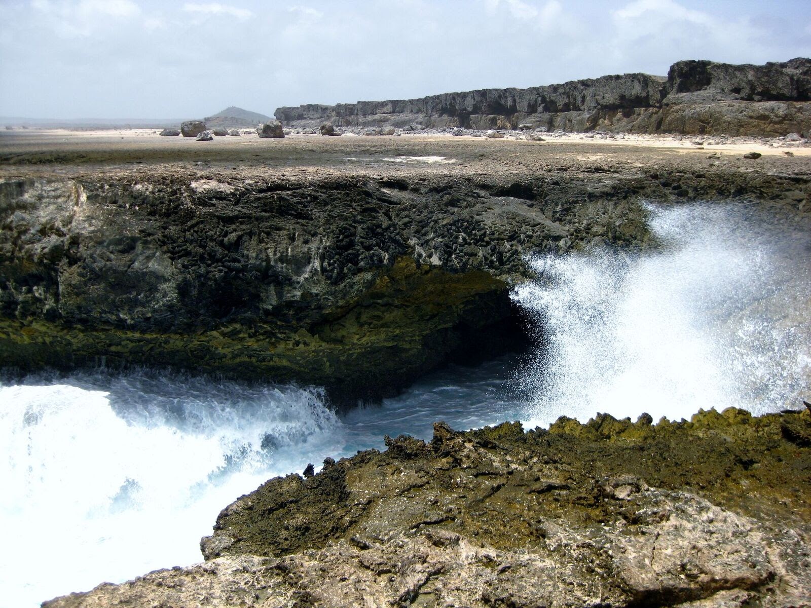 Waves crashing on the rock shore