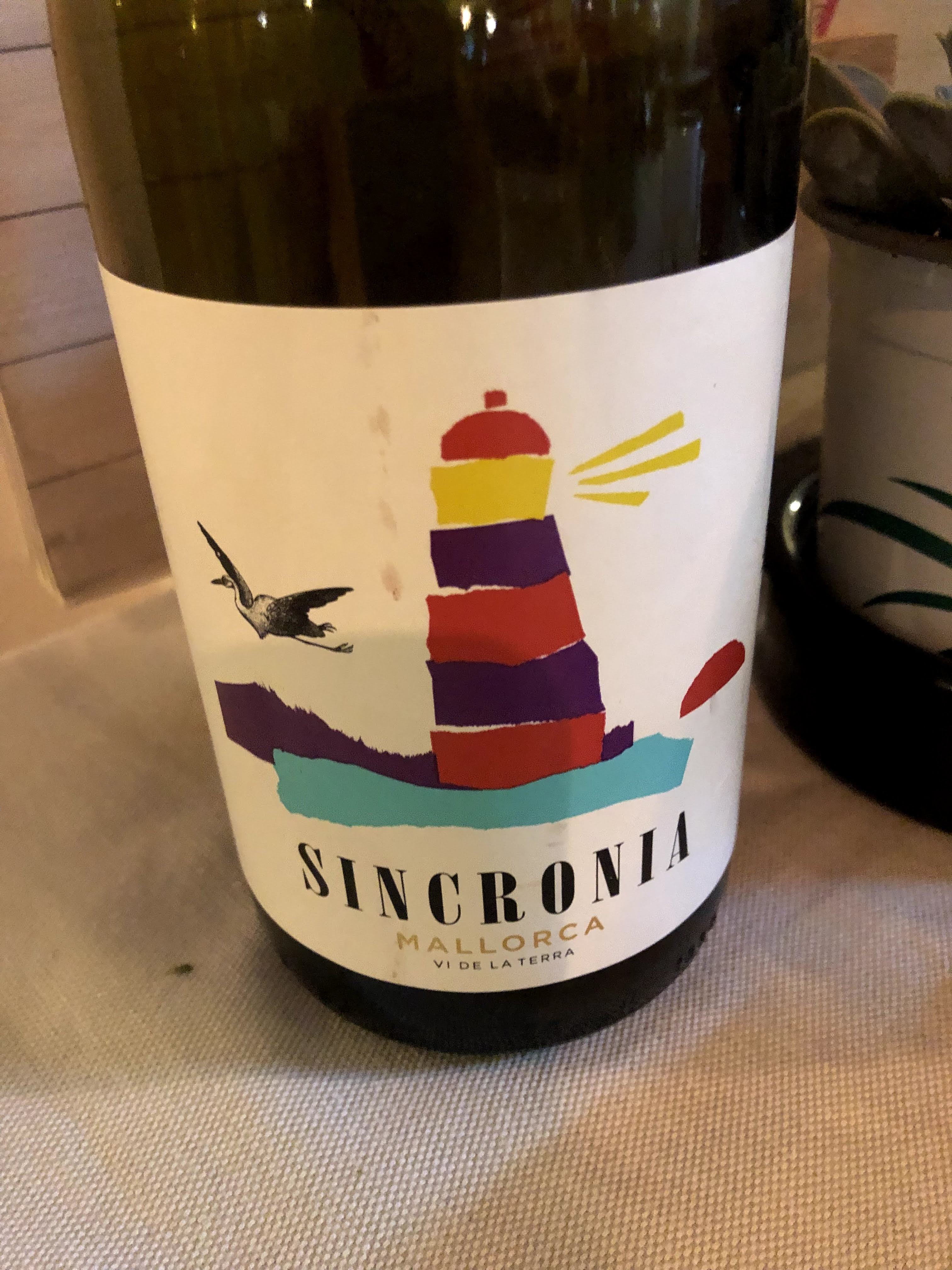 wine bottle with lighthouse logo